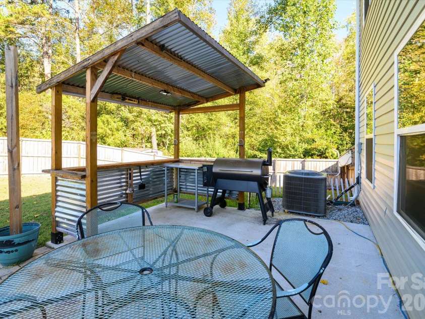 1345 Standing Oak Drive, Salisbury, NC 28146.  MLS# CAR4312108, YatesRealty ID 24018. Extended Patio and Outside Cooking Area