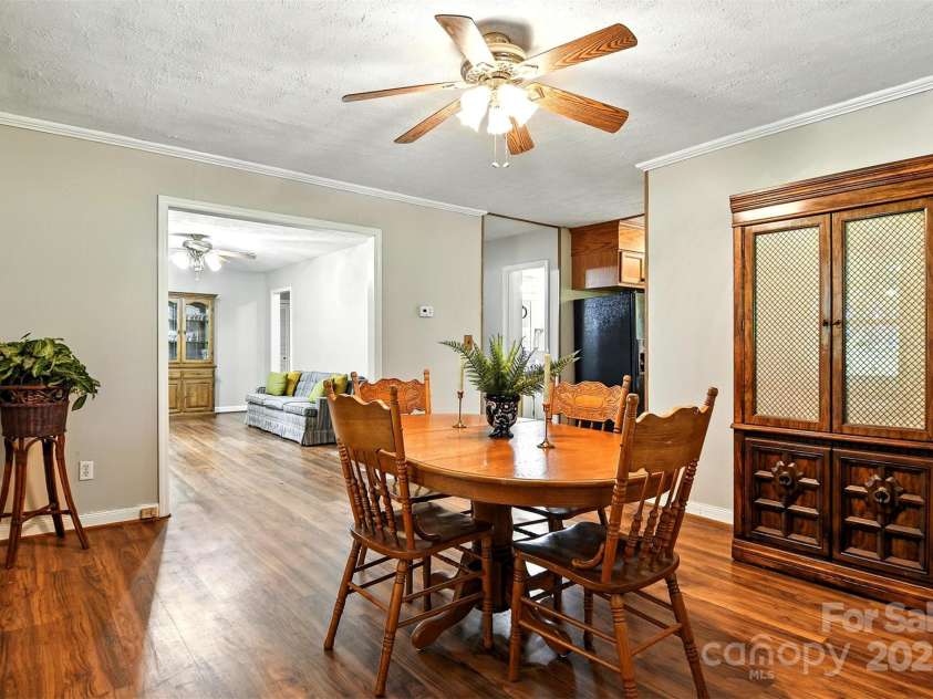 2911 Spencer Street, Lenoir, NC 28645.  MLS# CAR4266701, YatesRealty ID 24018. Dining Room opens to Living Room