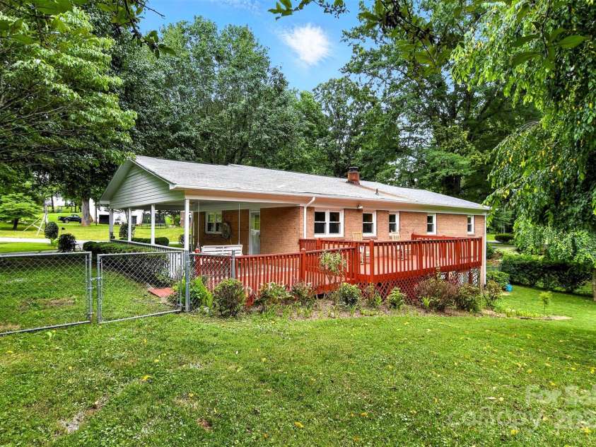 2911 Spencer Street, Lenoir, NC 28645.  MLS# CAR4266701, YatesRealty ID 24018. Lush Backyard