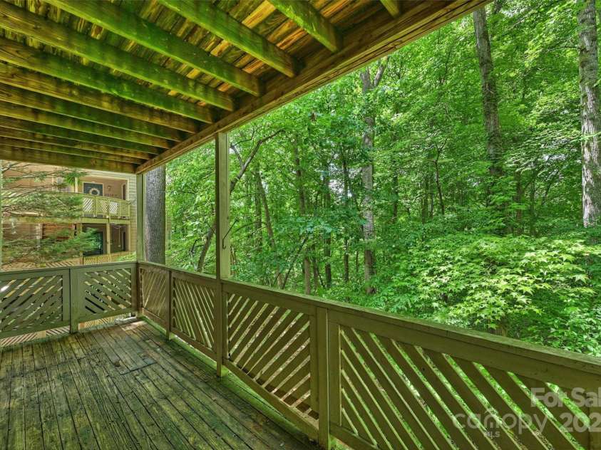 6016 Gray Gate Lane, Charlotte, NC 28210.  MLS# CAR4257900, YatesRealty ID 24019. Scenic deck overlooking wooded area