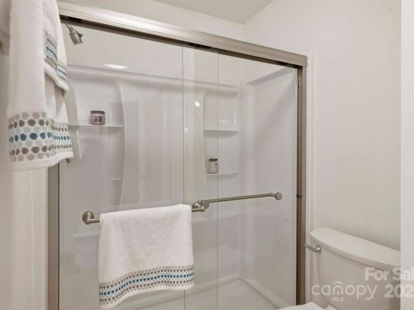 6016 Gray Gate Lane, Charlotte, NC 28210.  MLS# CAR4257900, YatesRealty ID 24019. Walk-in shower!