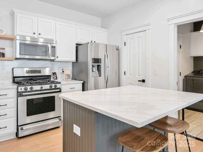 35 White Ash Drive, Asheville, NC 28803.  MLS# CAR4255921, YatesRealty ID 24020. Kitchen with gas stove