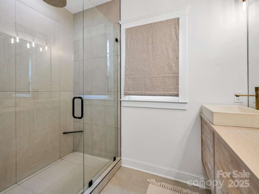 35 White Ash Drive, Asheville, NC 28803.  MLS# CAR4255921, YatesRealty ID 24020. Master bathroom with walk in shower