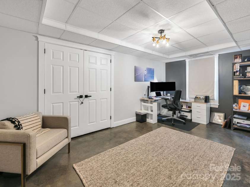 35 White Ash Drive, Asheville, NC 28803.  MLS# CAR4255921, YatesRealty ID 24020. Office/Bedroom Basement
