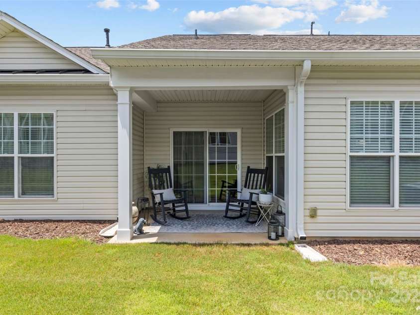 33124 Tanager Court, Fort Mill, SC 29707.  MLS# CAR4276689, YatesRealty ID 24021. Back patio