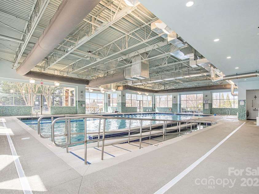 52095 Longspur Lane, Indian Land, SC 29707.  MLS# CAR4276043, YatesRealty ID 24022. Lake House indoor pool