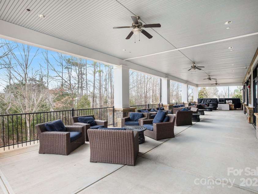 52095 Longspur Lane, Indian Land, SC 29707.  MLS# CAR4276043, YatesRealty ID 24022. Rear patio at The Lodge.