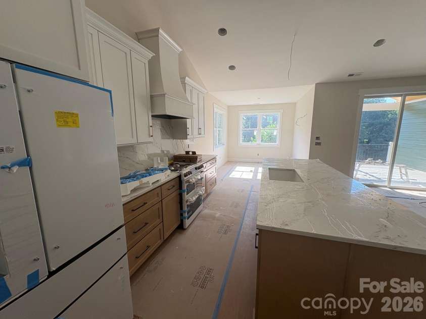 148 Triple Fairways Drive, Hendersonville, NC 28739.  MLS# CAR4383707, YatesRealty ID 24026. Kitchen & Dining