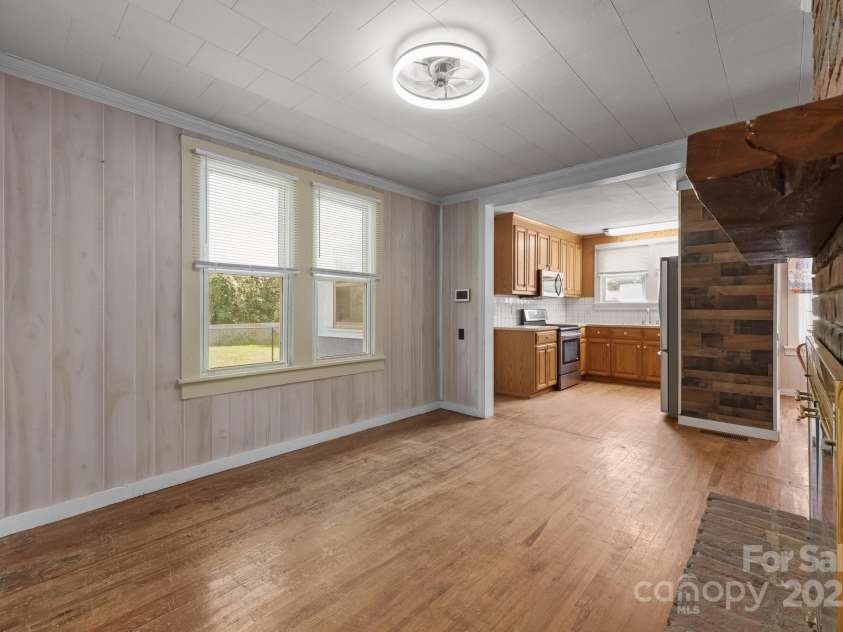 435 Stirewalt Road, China Grove, NC 28023.  MLS# CAR4273185, YatesRealty ID 24034. Family room and gas log fireplace