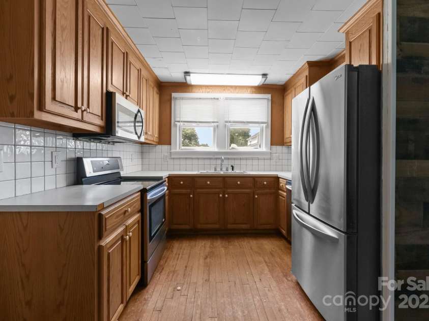 435 Stirewalt Road, China Grove, NC 28023.  MLS# CAR4273185, YatesRealty ID 24034. Kitchen comes with all stainless steel appliances