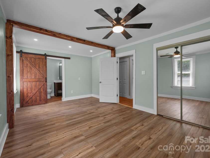 435 Stirewalt Road, China Grove, NC 28023.  MLS# CAR4273185, YatesRealty ID 24034. Primary bedroom features beautiful new LVP floors and en-suite bathroom