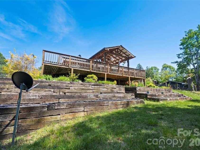 75 Hawthorne Drive, Brevard, NC 28712.  MLS# CAR4384254, YatesRealty ID 24035. Rear Exterior and yard
