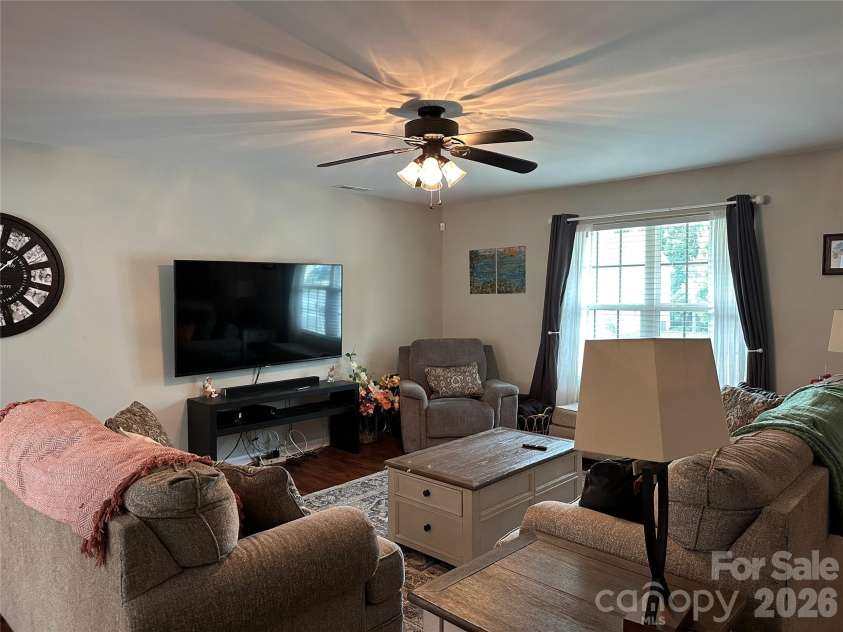 1309 Red Birch Place, Kannapolis, NC 28081.  MLS# CAR4373489, YatesRealty ID 24037. The open layout flows seamlessly into the dining area, creating an ideal space for relaxing or entertaining.