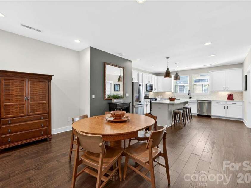 4136 Castleton Road, Charlotte, NC 28211.  MLS# CAR4381124, YatesRealty ID 24040. Dining area looking into the kitchen.