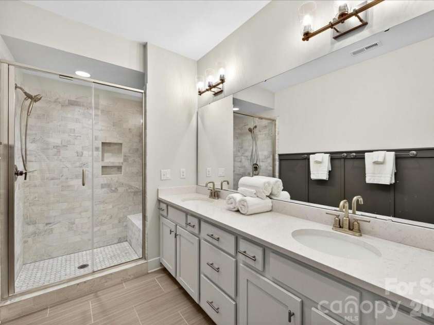 4136 Castleton Road, Charlotte, NC 28211.  MLS# CAR4381124, YatesRealty ID 24040. Dual vanity features quartz countertops.