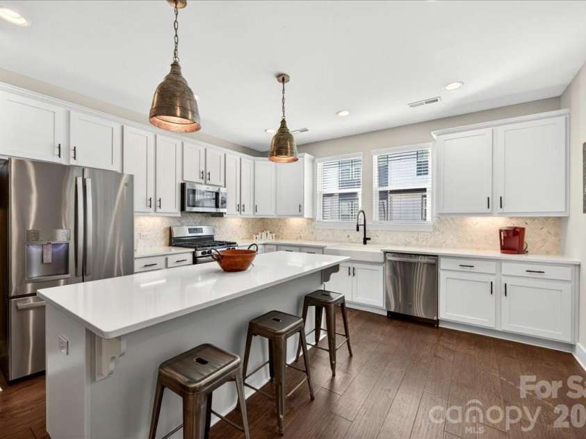 4136 Castleton Road, Charlotte, NC 28211.  MLS# CAR4381124, YatesRealty ID 24040. Huge kitchen with lots of cabinets for storage.