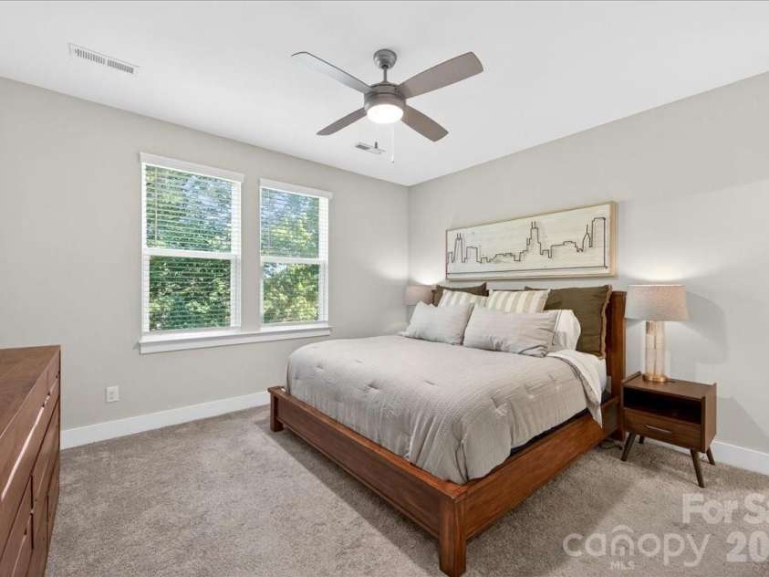 4136 Castleton Road, Charlotte, NC 28211.  MLS# CAR4381124, YatesRealty ID 24040. Primary bedroom on the third level with ceiling fan.