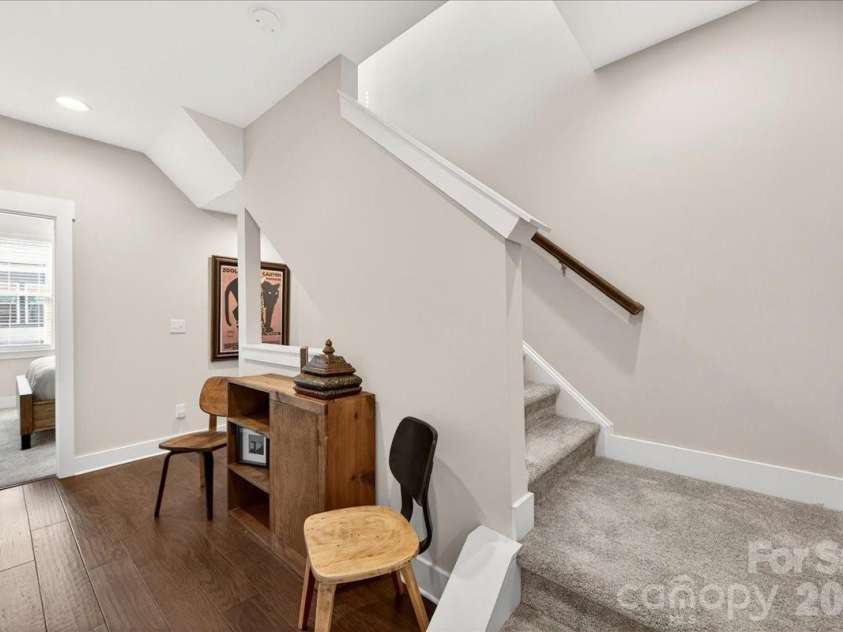 4136 Castleton Road, Charlotte, NC 28211.  MLS# CAR4381124, YatesRealty ID 24040. Third level landing/stairs leading to the fourth floor rec/bonus room.