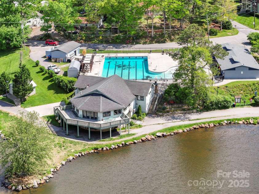 220 College Street, Black Mountain, NC 28711.  MLS# CAR4266840, YatesRealty ID 24041. Aerial view of Lake Tomahawk