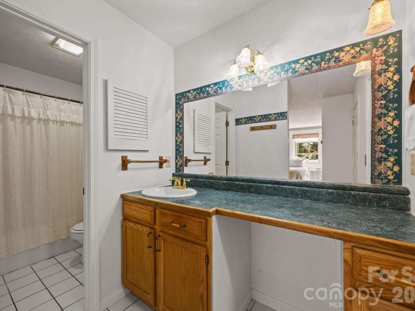 63 Chestnut Forest Road, Fairview, NC 28730.  MLS# CAR4379100, YatesRealty ID 24043. 