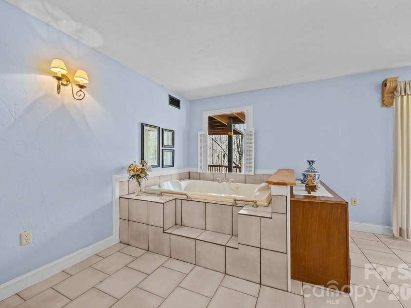 63 Chestnut Forest Road, Fairview, NC 28730.  MLS# CAR4379100, YatesRealty ID 24043. 