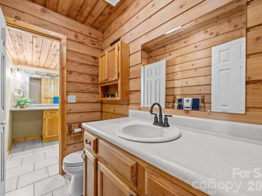 63 Chestnut Forest Road, Fairview, NC 28730.  MLS# CAR4379100, YatesRealty ID 24043. 