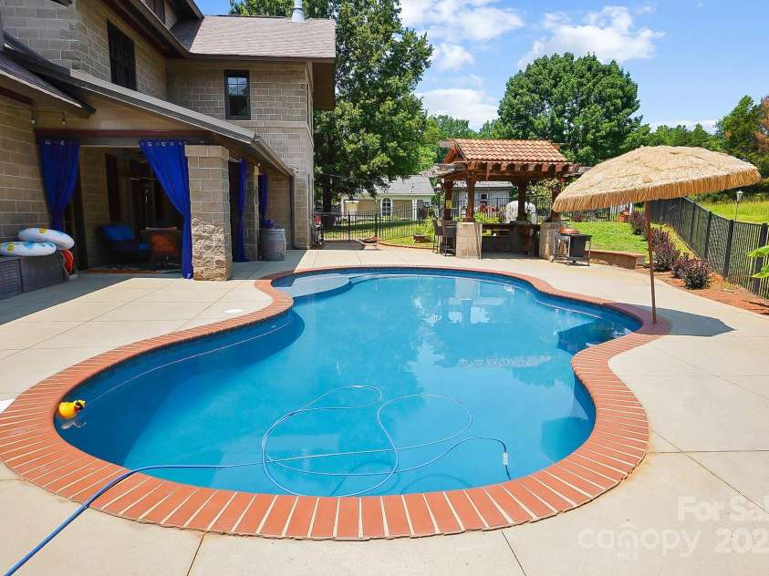 14701 Cabarrus Road, Mint Hill, NC 28227.  MLS# CAR4260366, YatesRealty ID 24046. Backyard Oasis