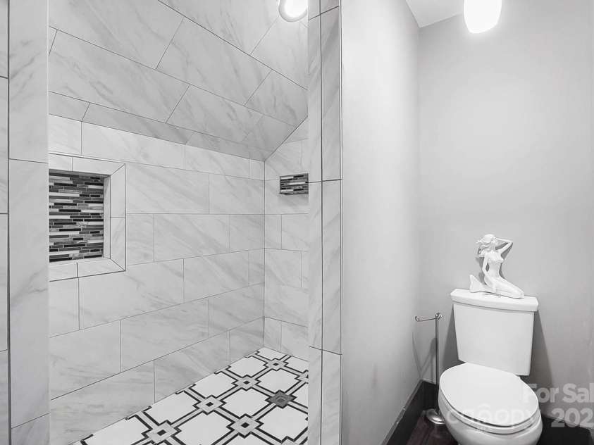 14701 Cabarrus Road, Mint Hill, NC 28227.  MLS# CAR4260366, YatesRealty ID 24046. Master/Primary Bathroom Walk In Tiled Shower