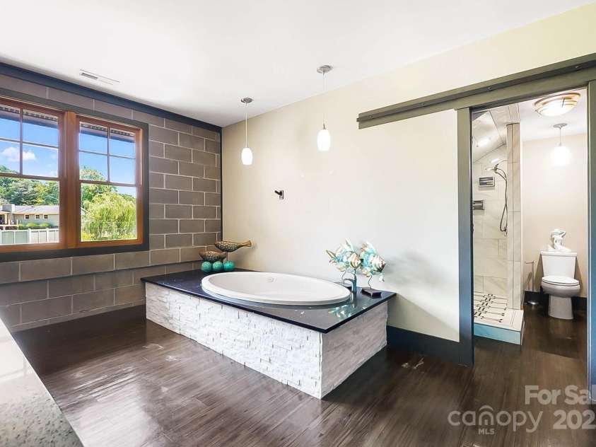 14701 Cabarrus Road, Mint Hill, NC 28227.  MLS# CAR4260366, YatesRealty ID 24046. Master/Primary Bathroom with Jacuzzi Tub.