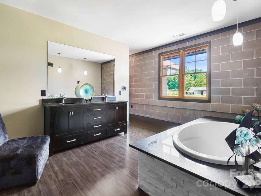 14701 Cabarrus Road, Mint Hill, NC 28227.  MLS# CAR4260366, YatesRealty ID 24046. Master/Primary Bathroom with Jacuzzi Tub.