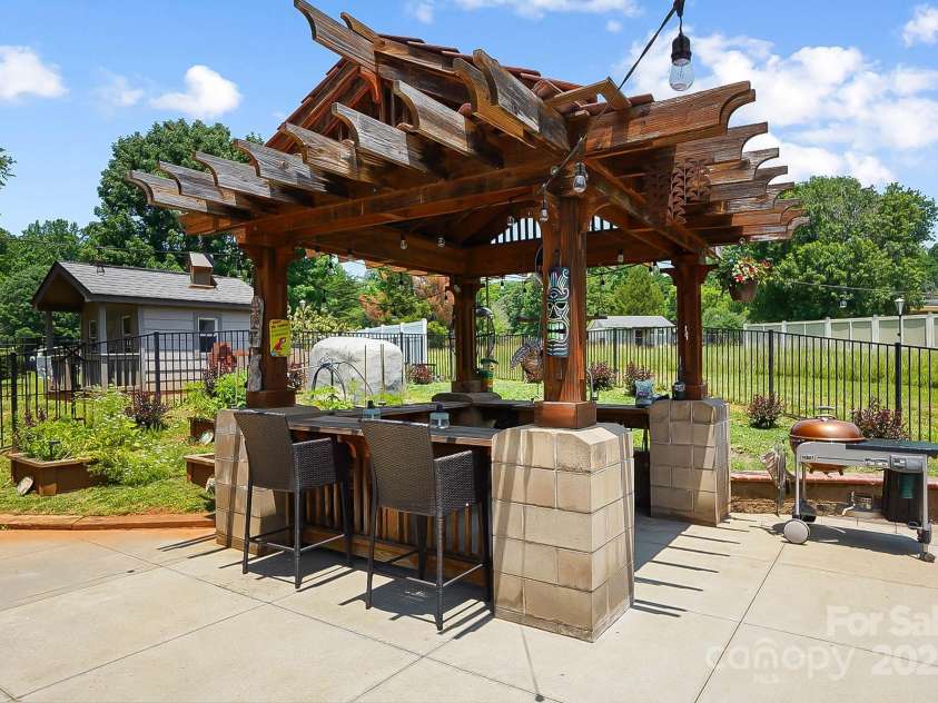 14701 Cabarrus Road, Mint Hill, NC 28227.  MLS# CAR4260366, YatesRealty ID 24046. Tiki Bar