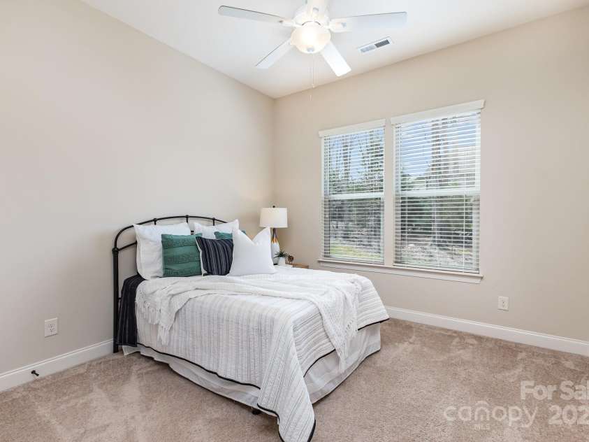 2110 Capricorn Avenue, Indian Trail, NC 28079.  MLS# CAR4237555, YatesRealty ID 24048. Guest bedroom on main level secondary 1