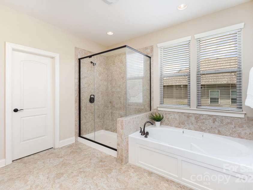2110 Capricorn Avenue, Indian Trail, NC 28079.  MLS# CAR4237555, YatesRealty ID 24048. Primary bath