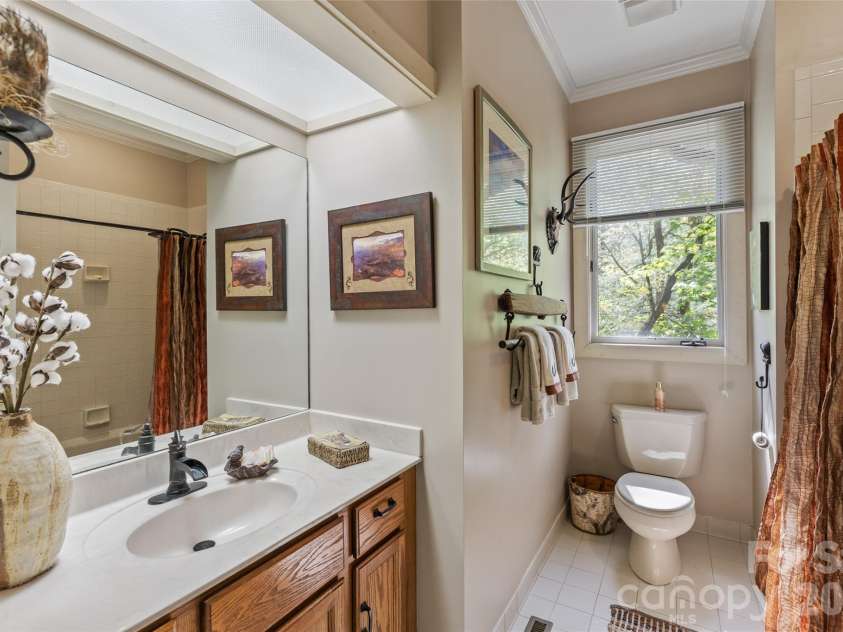21 Laurel Wood Court, Sapphire, NC 28774.  MLS# CAR4382297, YatesRealty ID 24049. 