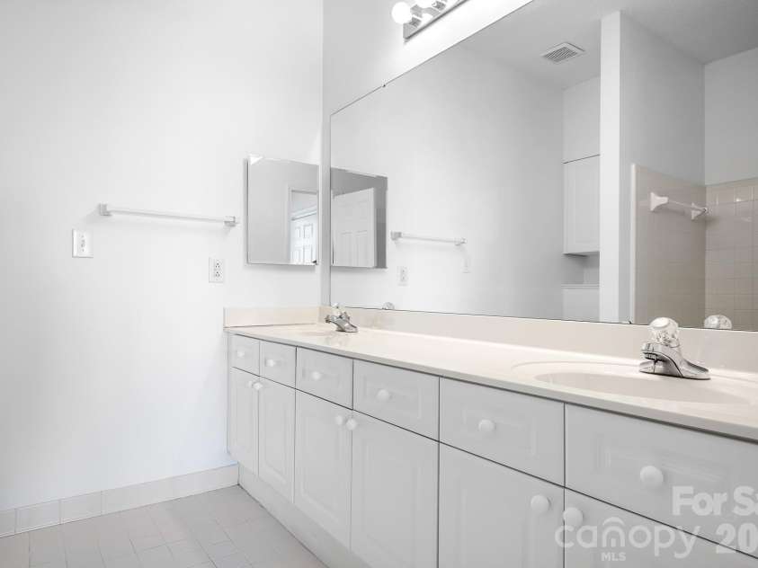 18816 Nautical Drive, Cornelius, NC 28031.  MLS# CAR4321844, YatesRealty ID 2405. Dual Vanity in Primary Bathroom.