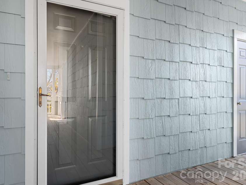 18816 Nautical Drive, Cornelius, NC 28031.  MLS# CAR4321844, YatesRealty ID 2405. Entry Door and Adjacent Storage Closet