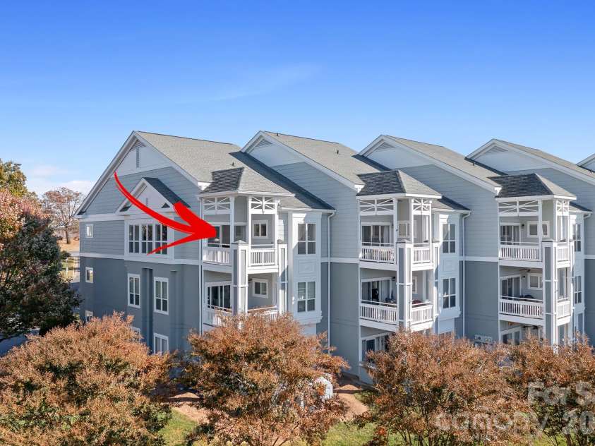 18816 Nautical Drive, Cornelius, NC 28031.  MLS# CAR4321844, YatesRealty ID 2405. Freshly Painted Exterior. This building has an Elevator!