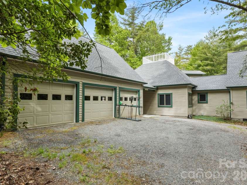 1592 Eagle Lake Drive, Brevard, NC 28712.  MLS# CAR4384665, YatesRealty ID 24052. 3 car garage
