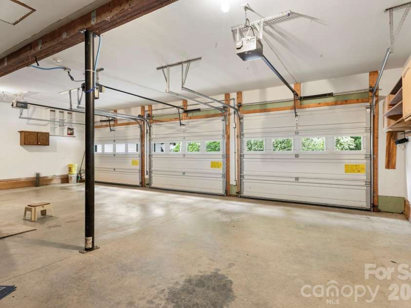 1592 Eagle Lake Drive, Brevard, NC 28712.  MLS# CAR4384665, YatesRealty ID 24052. 3 car garage