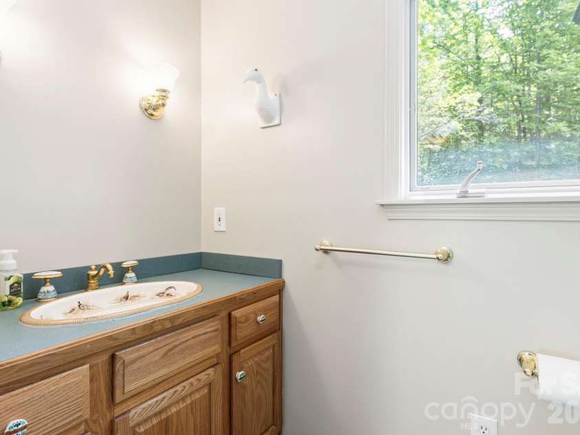 1592 Eagle Lake Drive, Brevard, NC 28712.  MLS# CAR4384665, YatesRealty ID 24052. 