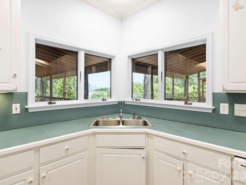 1592 Eagle Lake Drive, Brevard, NC 28712.  MLS# CAR4384665, YatesRealty ID 24052. 