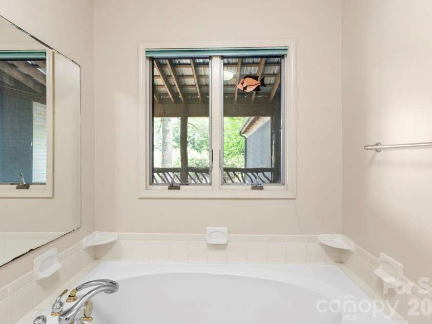 1592 Eagle Lake Drive, Brevard, NC 28712.  MLS# CAR4384665, YatesRealty ID 24052. 