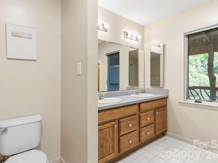 1592 Eagle Lake Drive, Brevard, NC 28712.  MLS# CAR4384665, YatesRealty ID 24052. 