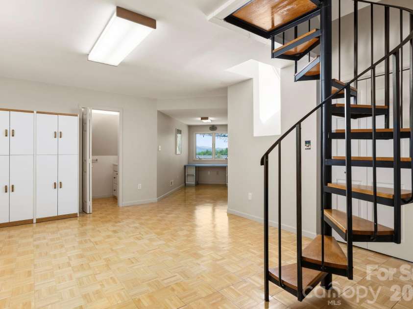 1592 Eagle Lake Drive, Brevard, NC 28712.  MLS# CAR4384665, YatesRealty ID 24052. Bonus room upstairs with access to widow's walk