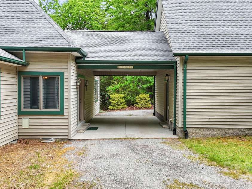 1592 Eagle Lake Drive, Brevard, NC 28712.  MLS# CAR4384665, YatesRealty ID 24052. Carport
