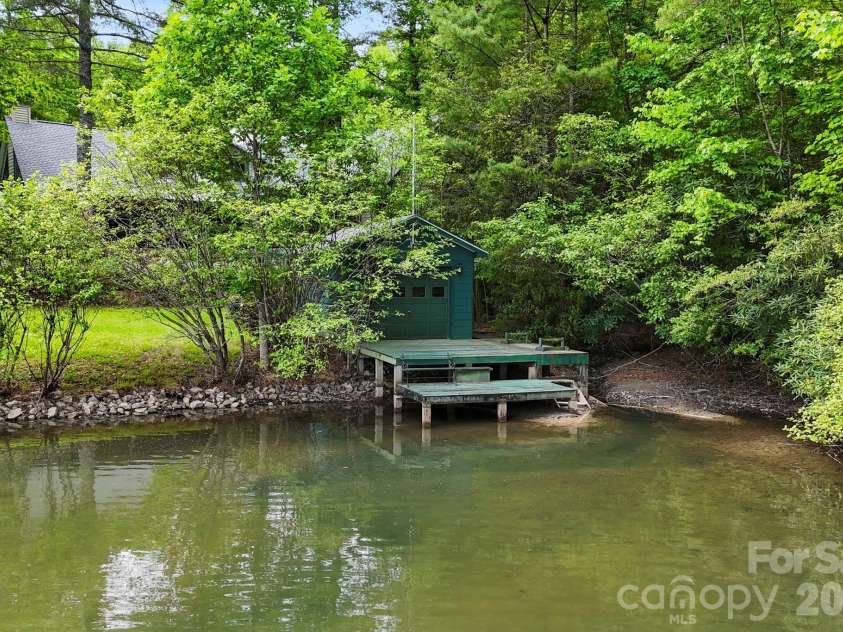 1592 Eagle Lake Drive, Brevard, NC 28712.  MLS# CAR4384665, YatesRealty ID 24052. Private Dock