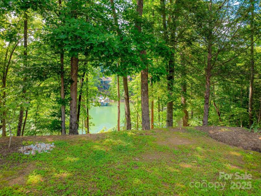 357 Lentz Landing Lane, Nebo, NC 28761.  MLS# CAR4256911, YatesRealty ID 24063. Water on Both Sides of Property