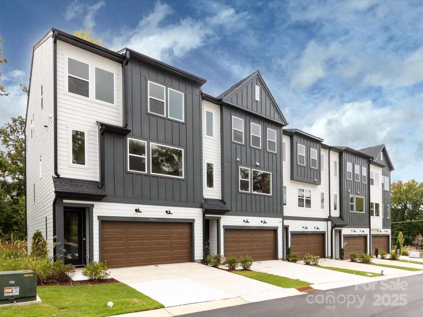 7944 Cedarsmith Court, Charlotte, NC 28217.  MLS# CAR4215191, YatesRealty ID 24064. Front Exteriors With 2-bay Side by Side Garages.