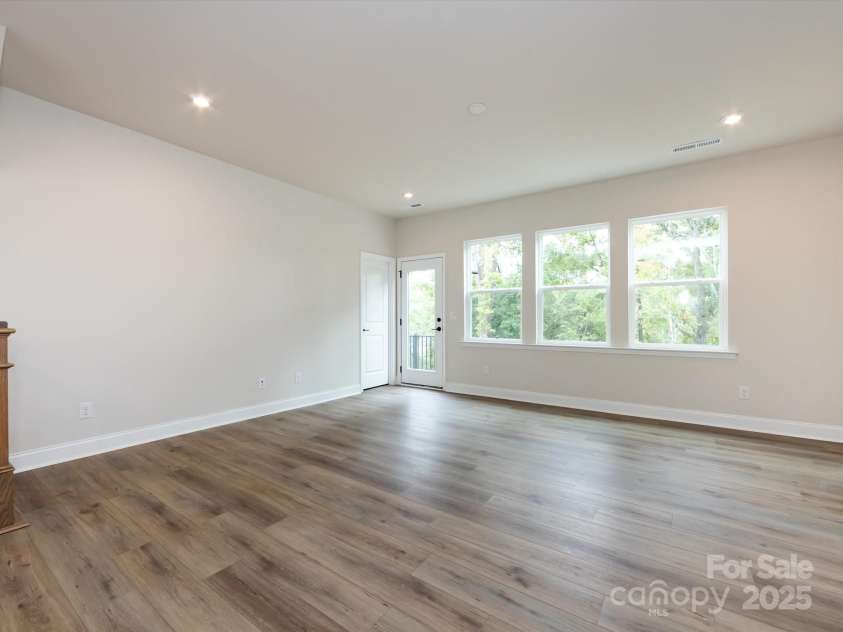 7944 Cedarsmith Court, Charlotte, NC 28217.  MLS# CAR4215191, YatesRealty ID 24064. Great Room Featuring Bright Large Windows.