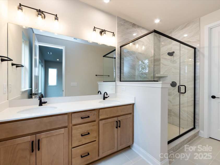 7944 Cedarsmith Court, Charlotte, NC 28217.  MLS# CAR4215191, YatesRealty ID 24064. Primary En Suite Bath with Dual Vanity and Loads of Storage.